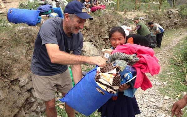 Photo taken from AHF website: AHF Ambassador distributes relief supplies to communities across the lower Solu Khumbu